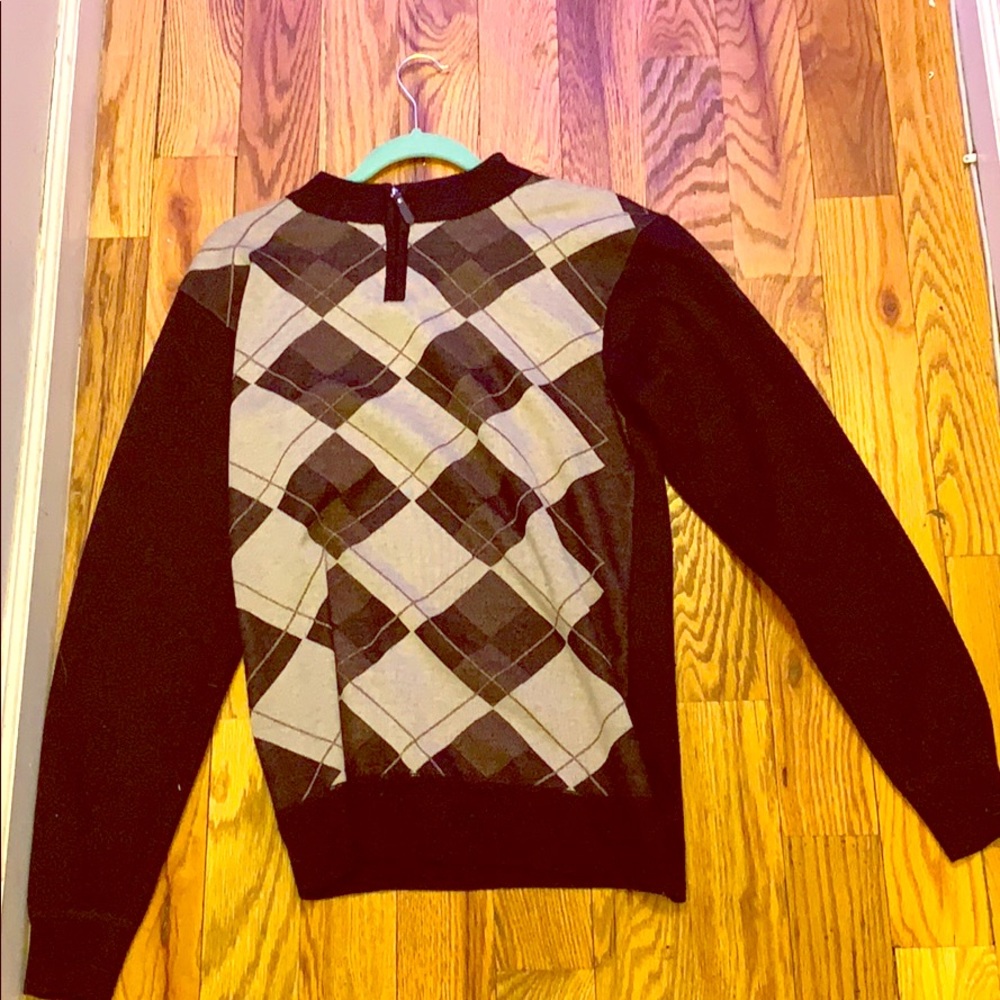 A plaid sweater